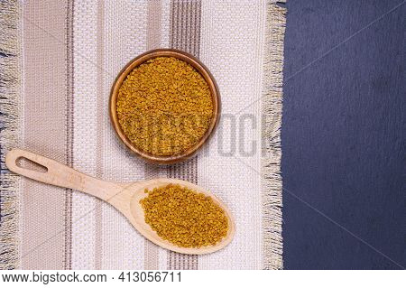 Seeds Medicinal Plant Fenugreek On A Wooden Light Table Closeup. Shambala Grains For Use In Alternat