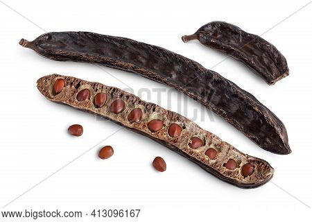 Ripe Carob Pods And Bean Isolated On White Background With Clipping Path And Full Depth Of Field