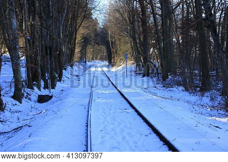 Railway Tracks Run Straight Away From The Viewer