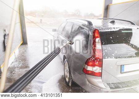 Contactless  Car Wash Self Service System. Washing Dirty Car In Car Wash Station With Foam