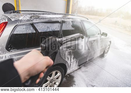 Contactless  Car Wash Self Service System. Washing Dirty Car In Car Wash Station With Foam