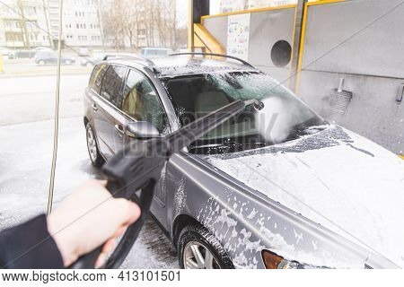 Contactless  Car Wash Self Service System. Washing Dirty Car In Car Wash Station With Foam