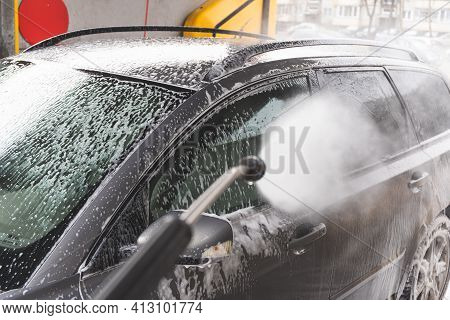 Contactless  Car Wash Self Service System. Washing Dirty Car In Car Wash Station With Foam