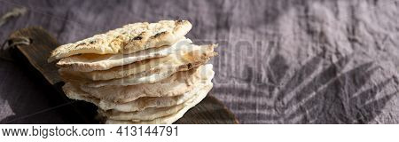 Homemade Matzo  With Microgreen Peas. Unleavened Flatbread Bread. Pesah Celebration Concept.  Jewish