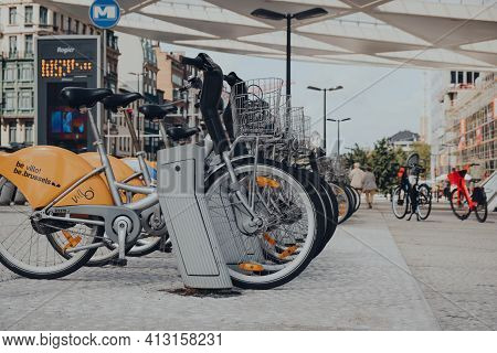 Brussels, Belgium - August 16, 2019: Row Of Yellow Villo Bikes, A Public Bicycle Rental Programme, O