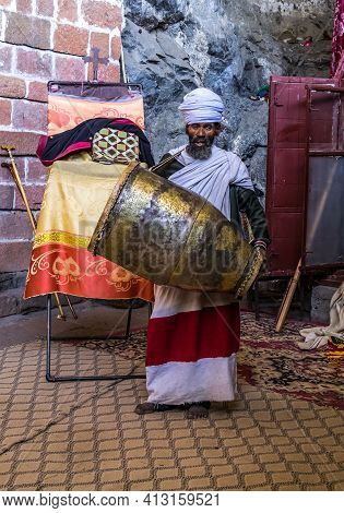 Lalibela, Ethiopia - Feb 14, 2020: Ethiopian Priest At The Famous Monastery Neakuto Leab Near Lalibe