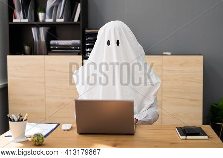 Ghostwriter In Office. Creative Ghost Writer Using Computer