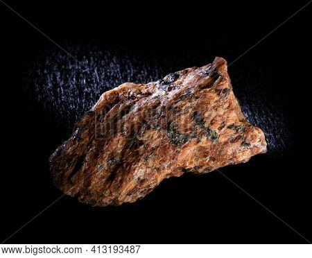 Green Granite And Hornblende Mineral Rock Isolated On Black Background. For Geology Mineralogy Websi