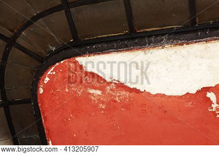Part Of Worn Underside To Old Balcony In Iron And Concrete