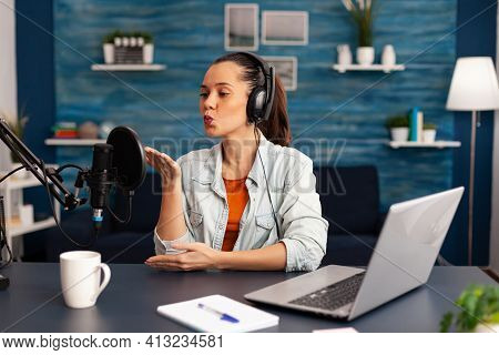 Vlogger Giving Flying Kiss While Making Daily Online Video Blog. Digital Influcencer Recording Talk 