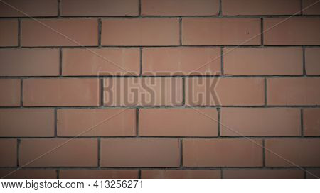 Brick Vintage Wall Full Frame With Dim Lighting, Textured Retro Brickwork Background In Soothing Ton
