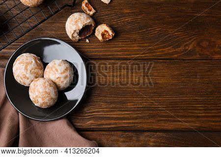 Tasty Homemade Gingerbread Cookies On Wooden Table, Flat Lay. Space For Text