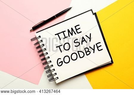 Notebook With Text Time To Say Goodbye On Color Background, Flat Lay