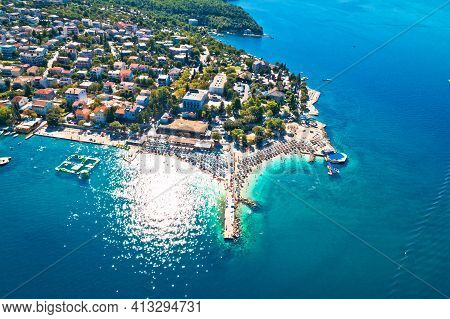 Tourist Town Of Selce And Poli Mora Turquoise Beach Aerial View, Crikvenica Riviera In Croatia