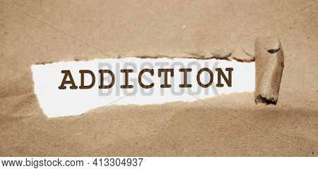 Addiction Word Under Brown Torn Paper . Stop Smoking Quit Drinking Refuce Gaming And Gambling Concep