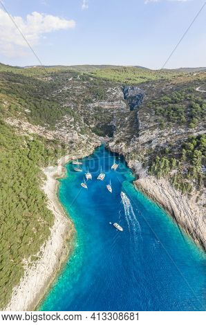 Aerial Drone Shot Of Iconic Stiniva Cove Beach Of Adriatic Sea On Vis Island In Croatia Summer