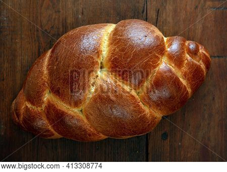 Easter Tsoureki Braid, Greek Easter Sweet Bread, On Wooden Background