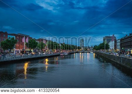 Dublin, Ireland, August 2019 Dublin nightlife. Night photography of OConnell bridge and Eden Quay illuminated by city lights