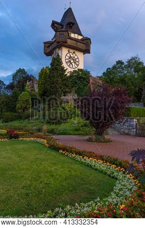 The Famous Clock Tower (grazer Uhrturm) And Gardens On Shlossberg Hill, Graz, Styria Region, Austria