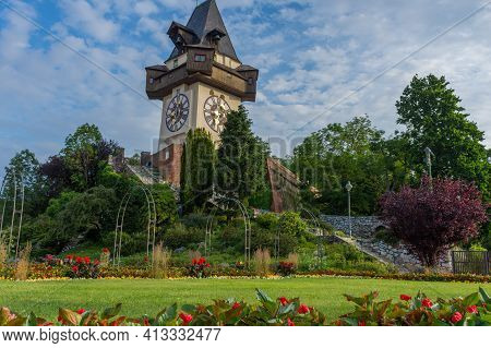 The Famous Clock Tower (grazer Uhrturm) And Gardens On Shlossberg Hill Before Sunrise,in Graz, Styri