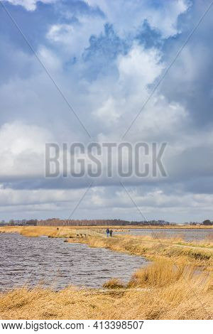 Walking Path Between Two Lakes At The Roegwold Nature Area In Groningen, Netherlands