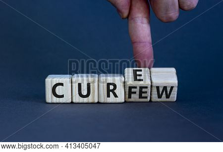 Curfew And Cure Symbol. Businessman Turns Cubes And Changes The Word 'curfew' To 'cure'. Beautiful G
