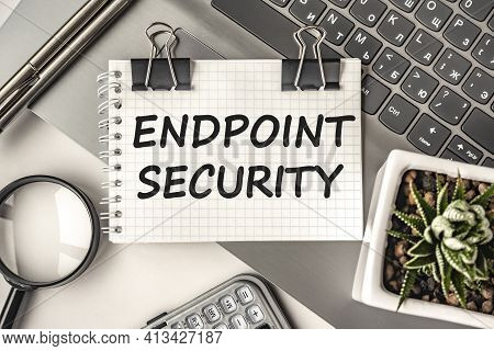 Endpoint Security Text On A Notepad And Laptop, Office Tools. Business, Financial Concept. Remote Tr