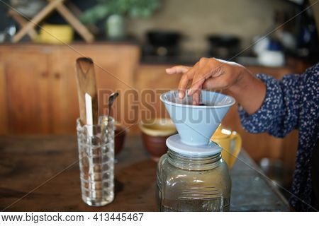 Barista Preparing Brewing Coffee With Coffee Maker And Drip Kettle.
