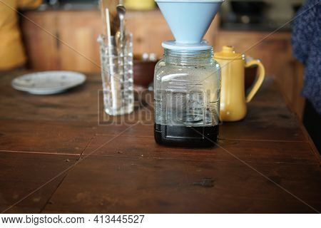 Barista Preparing Brewing Coffee With Coffee Maker And Drip Kettle.