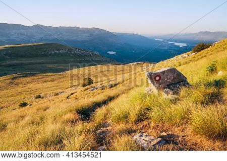 Hiking Trail Mark Painted On Rock. Landscape View From Sinjal Or Dinara (1831 M) Mountain -the Highe