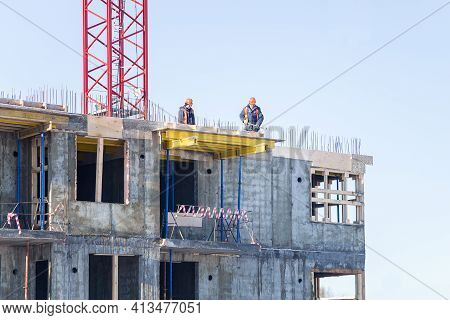 Petrozavodsk, Russia - February 13th, 2019: Builders Are Making A Concrete Screed Between The Floors