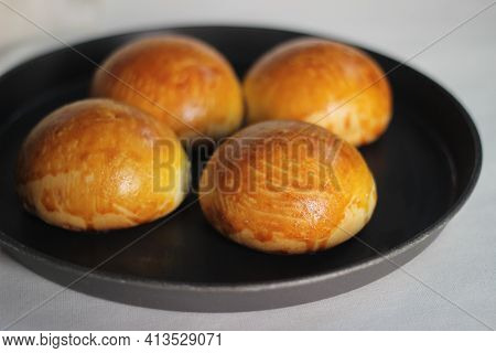 Glazing Gone Wrong While Baking Brioche Buns, A French Yeast Bread Enriched With Milk, Butter And Eg