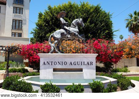 LOS ANGELES, CALIFORNIA - JUNE 12, 2018: The Antonio Aguilar Statue at El Pueblo de Los Angeles Historical Monument, Olvera Street.