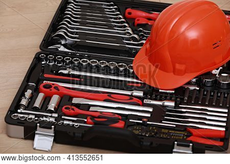Toolbox, Tools Kit Detail And Orange Protective Helmet Close Up. Instruments. Set Of Tools. Car Tool