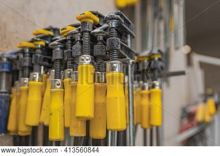 F Clamps, Manual, In Production. Concept Of Woodworking, Working Tools.
