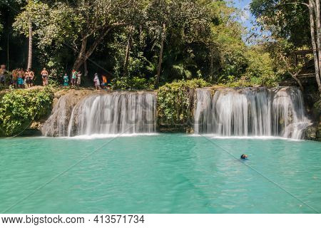 Siquijor, Philippines - February 9, 2018: People Enjoy Cambugahay Falls On Siquijor Island, Philippi