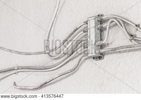 Antenna Splitter On White Wall, System With Tv Antenna Cable Splitter.