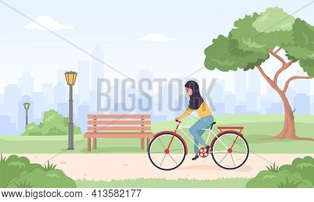 Arab Woman In Hijab On Bicycle Rides Around City. Spring Or Summer Landscape. Cute Happy Young Girl 