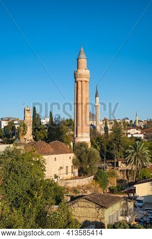 Historic clock tower and Yivli minaret in Kaleici old town of Antalya, Turkey