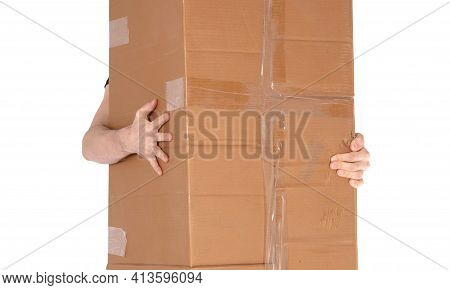Man Holding A Oversized Cardboard Box, Isolated On White