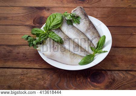 Raw Carcasses Of The Notothenia Fish Without Of Heads And Tails, Cleaned From Fish Scales, Twigs Of 