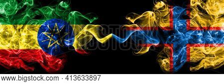 Ethiopia, Ethiopian Vs Ingrian People Smoky Mystic Flags Placed Side By Side. Thick Colored Silky Ab