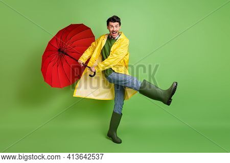 Full Size Photo Of Young Happy Excited Good Mood Crazy Man Dancing With Umbrella In Hands Isolated O