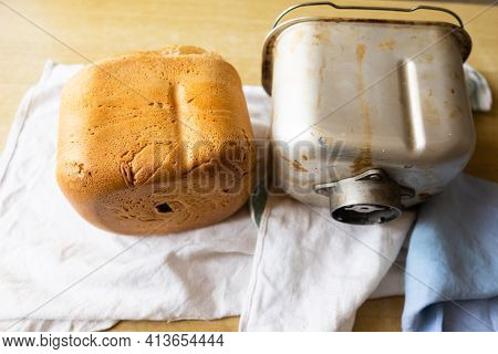 Home Baked Bread. \rfreshly Made White Bread Is Removed From The Bread Pan
