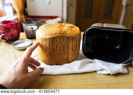 Home Baked Bread. \rfreshly Made White Bread Is Removed From The Bread Pan