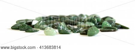 Macroshooting Of Natural Mineral Rock Specimen - Tumbled Green Aventurine Gemstone Isolated On White