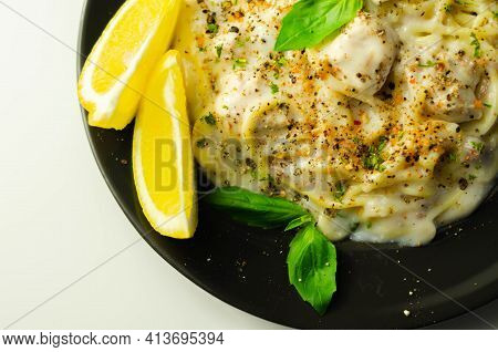 Carbonara, Spaghetti With A Cheese And Smoked Bacon Sauce Topped With Chicken Breast Pieces And Rega