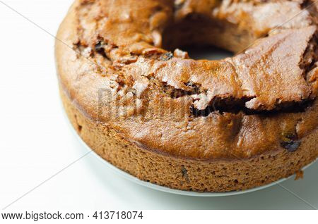 Freshly Made Spiced Fruit Ring Loaf Cake  On The White  Background, 
Traditional British Cake