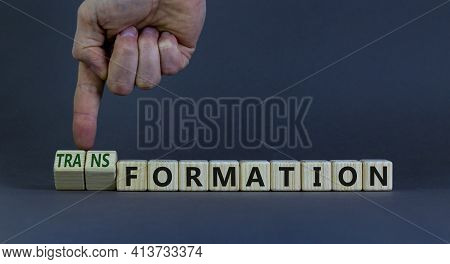 Formation Or Transformation Symbol. Businessman Turns Cubes And Changes The Word Formation To Transf