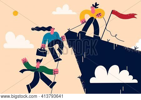 Business Teamwork, Leadership And Support Concept. Business Leader Standing On Mountain Peak Helping